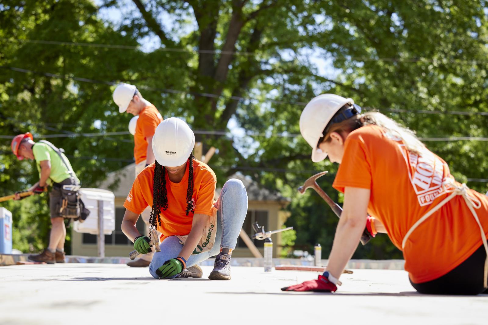Home Depot volunteers building a Habitat house.