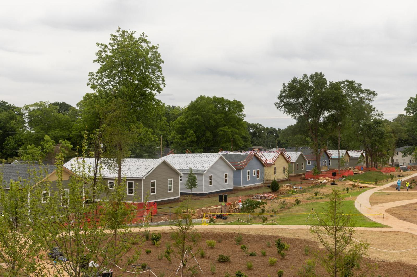 Wide shot of houses under construction at the 2026 Carter Work Project.