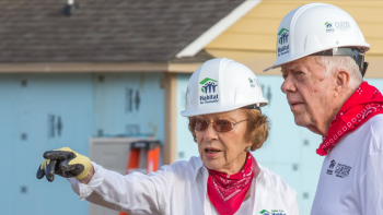 Jimmy and Rosalynn Carter on a Carter Work Project build site.