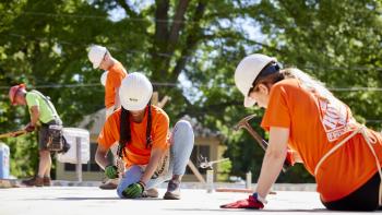 Home Depot volunteers building a Habitat house.