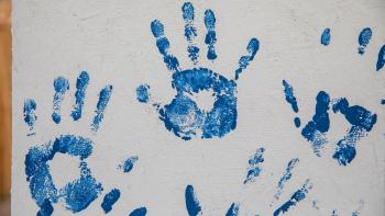 Blue handprints from a Women Build event in Fort Worth, TX. 