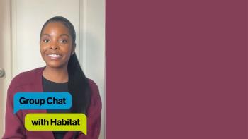 A woman wearing a maroon sweater sits in front a white door. Text in front of her says Habitat Group Chat.