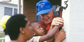 President Carter and homeowner family