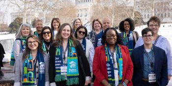 Group photo outside in front of the Capitol building.