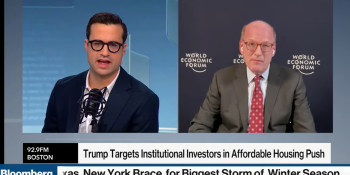Split screen image of two men, with Jonathan Reckford (right) being interviewed on Bloomberg Live.